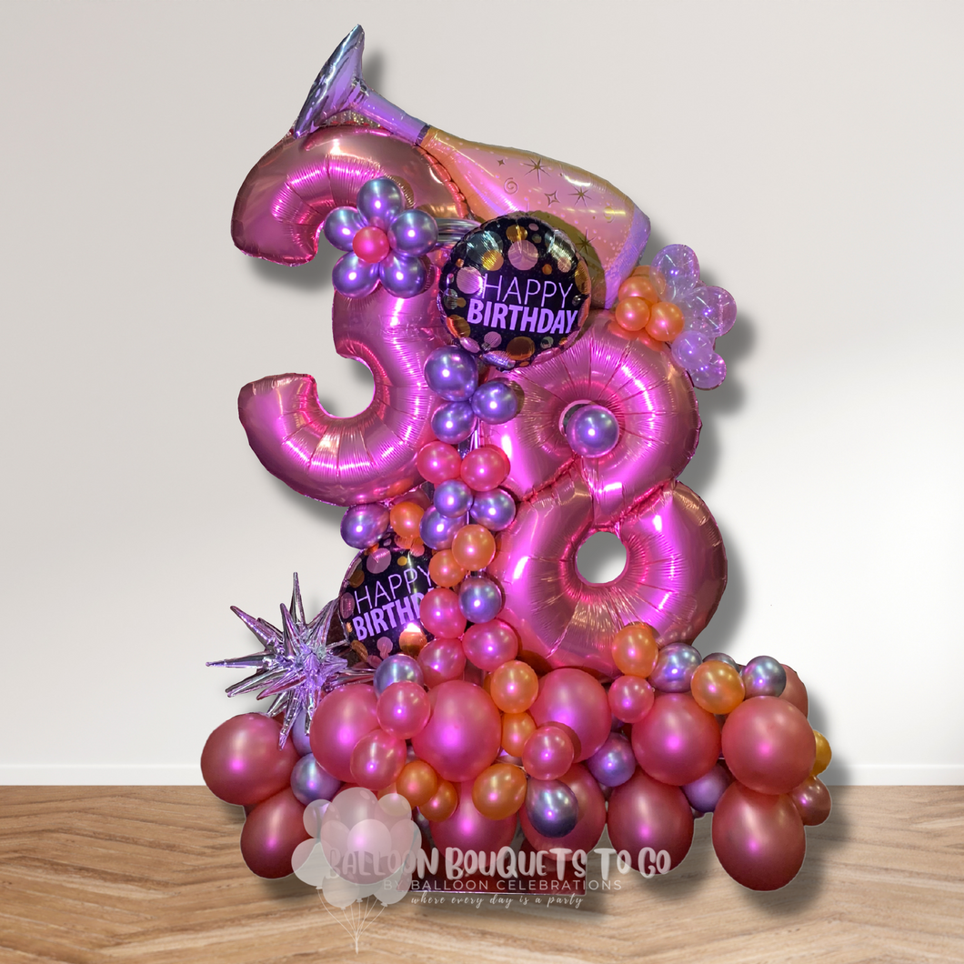 Champagne bubbles and flowers birthday balloon bouquet